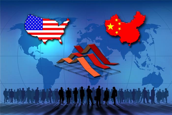 The U.S. is preparing to raise interest rates while China goes the other way. The U.S. is preparing to raise interest rates while China goes the other way.